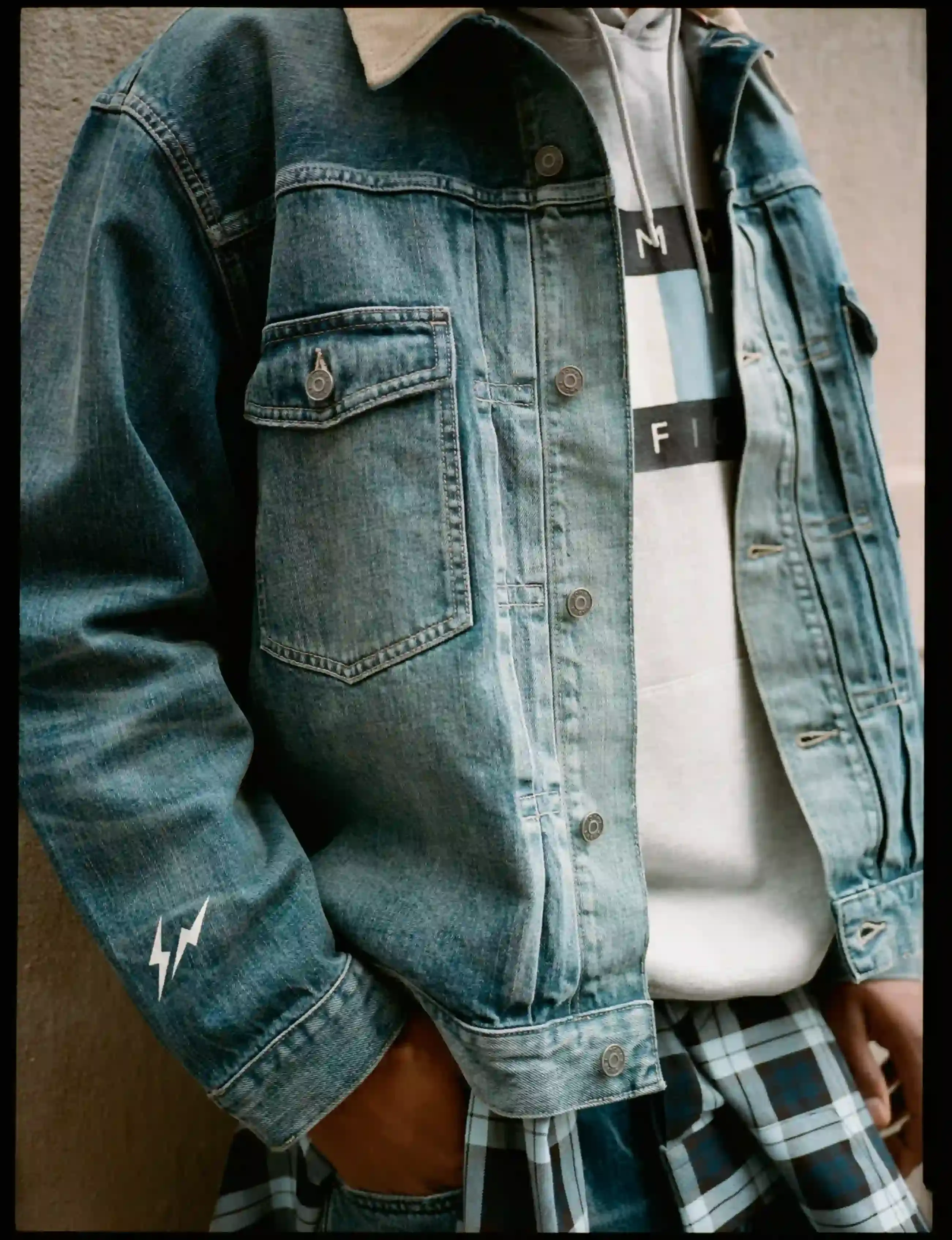 TOMMY HILFIGER AND FRGMT RELEASE A LIGHT BLUE CAPSULE image about the Tommy Hilfiger x FRGMT capsule collection. It covers the 1990s-based pieces, the light blue palette, quotes from Tommy Hilfiger and Hiroshi Fujiwara, the campaign film and the October 15, 2026 release. (image 2 of 8)