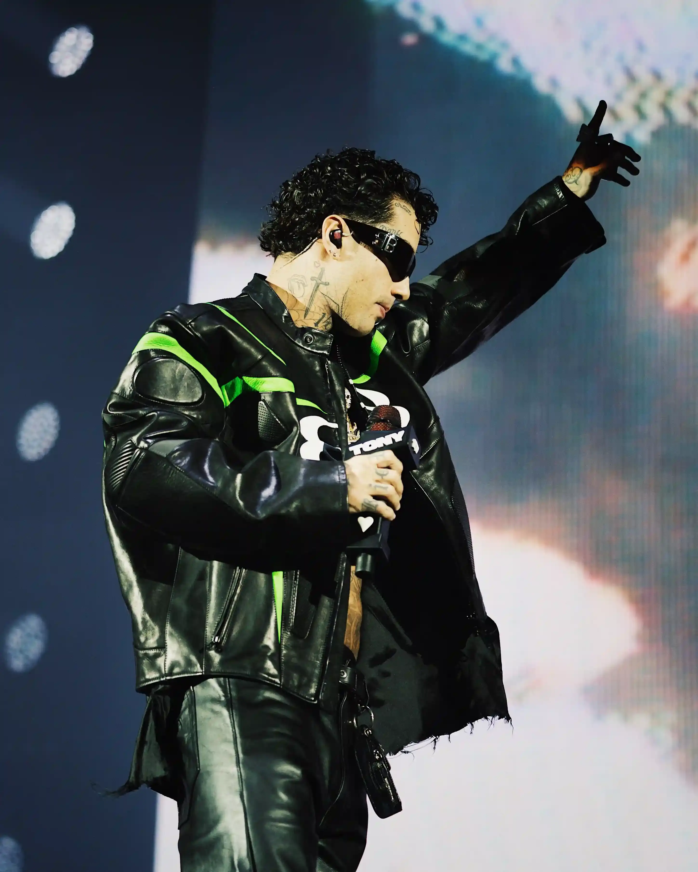 Tony Effe performs at sold-out concert in Milan's Unipol Forum. Young fans fill venue for Dark Polo Gang member's show featuring multiple guest artists. Performance showcases Tony's artistic growth and trap music's evolution in Italy (image 4 of 7)