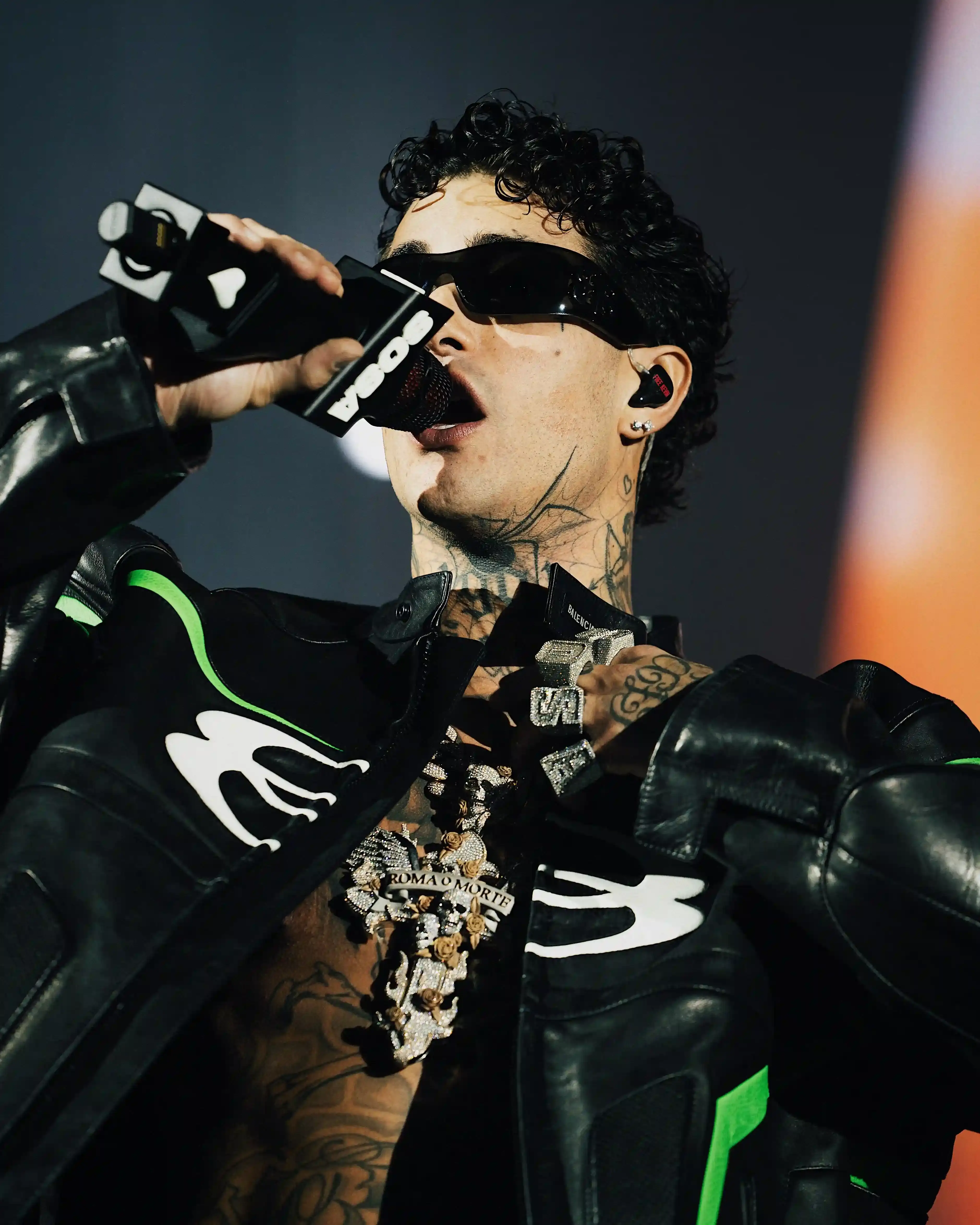 Tony Effe performs at sold-out concert in Milan's Unipol Forum. Young fans fill venue for Dark Polo Gang member's show featuring multiple guest artists. Performance showcases Tony's artistic growth and trap music's evolution in Italy (image 2 of 7)