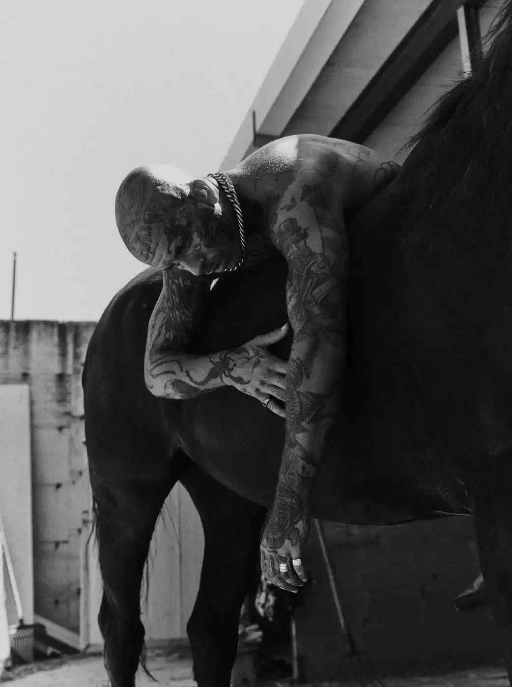 Portrait of Tony Scorpioni, a multidisciplinary artist with a distinctive style blending music, fashion and visual arts. (image 2 of 5)