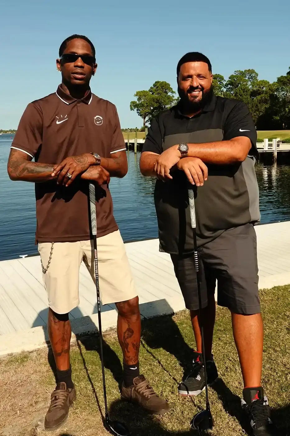 Dj Khaled Travis Scott & Dj Khaled playing golf wearing a brown Dark Mocha polo with Cactus Jack and Nike logos during Reggie Jackson's Celebrity Golf Classic
