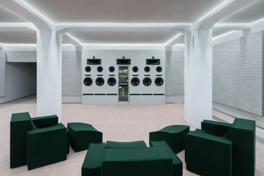 TRIENNALE MILANO OPENS VOCE AUDIO SPACE image about Voce, a new audio venue at Milan's Triennale Museum combining listening room and cocktail service. Features details about architectural design, acoustic systems, programming, and operating hours. Located at Palazzo dell'Arte with evening cocktail service Tuesday through Sunday. (image 14 of 14)
