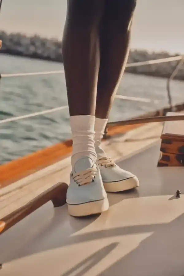 TYLER, THE CREATOR UNVEILS CONVERSE ARCHIVE COLLECTION image of the new collaboration between Tyler, The Creator's GOLF le FLEUR* brand and Converse. The collection, named "1908" after Converse's founding year, features two archive shoe models: the Naut-1 from 1971 and the Coach Jogger from 1976, which was originally an Olympic running shoe. Tyler has redesigned both models with preppy elements, co-branded logos, pastel colors, and in some cases, the signature "Darryl" pattern featuring repeating Airedale Terrier images. This collaboration represents a new direction for their partnership by focusing on previously unused historical designs from Converse's archives. The collection will be available online starting June 20. (image 5 of 6)
