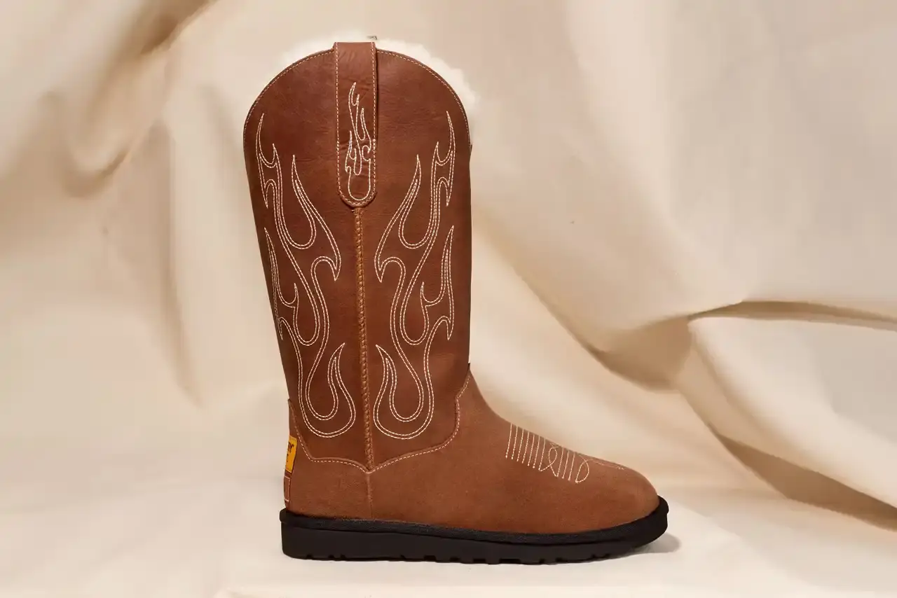 UGG AND GALLERY DEPT. RETURN WITH UPCYCLED WESTERN COLLECTION Brown leather UGG x GALLERY DEPT. Stitched Boot featuring all-over embroidery detail and lug sole, shown from side angle (image 5 of 7)