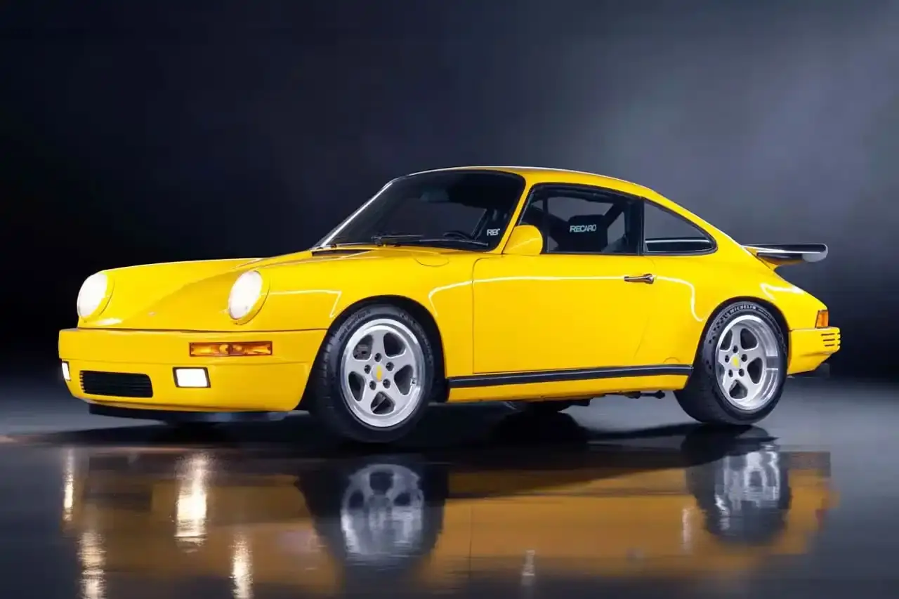 Gooding & Company Yellow 1989 RUF CTR Yellowbird parked at Gooding & Company's Amelia Island Auction before its record $6M sale.