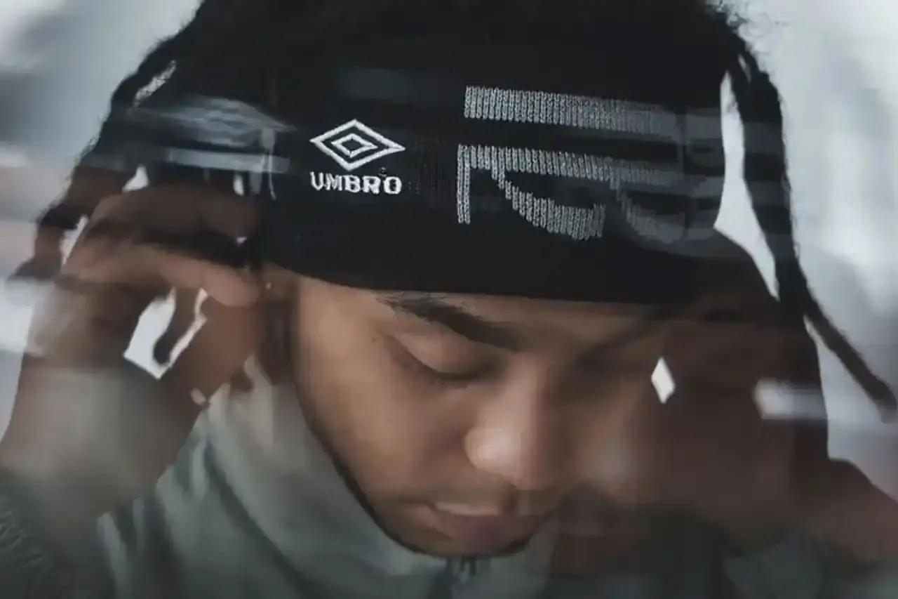 Umbro Collection items from Umbro x Rainbow Disco Club collaboration including track jackets, pants, headbands, and mesh bags.