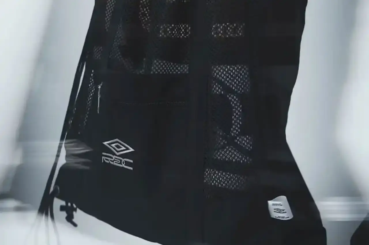 Umbro Collection items from Umbro x Rainbow Disco Club collaboration including track jackets, pants, headbands, and mesh bags. (image 4 of 7)