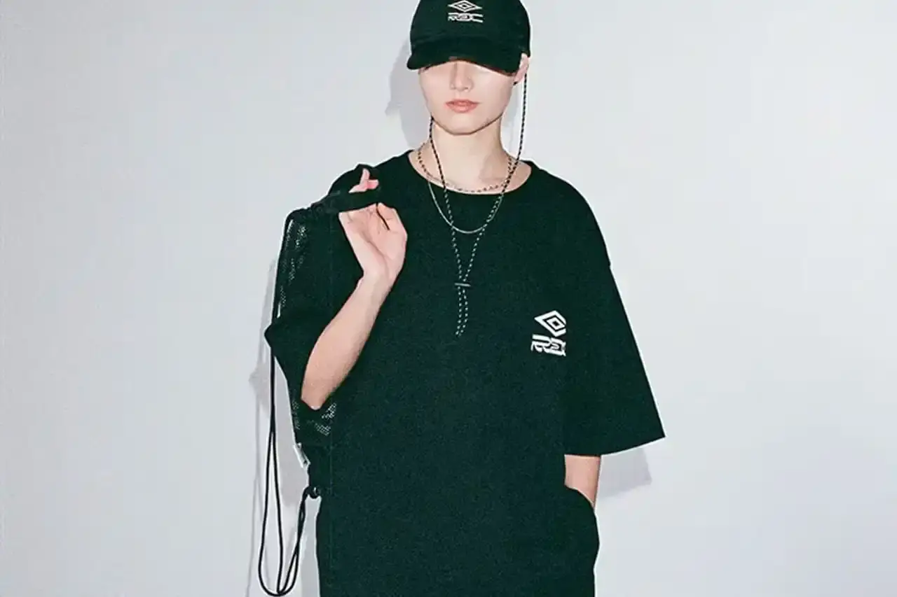 Umbro Collection items from Umbro x Rainbow Disco Club collaboration including track jackets, pants, headbands, and mesh bags. (image 3 of 7)