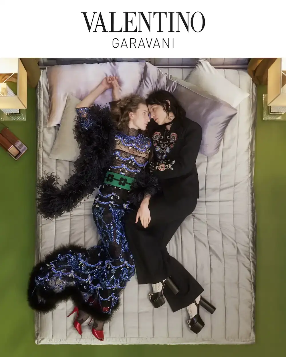 VALENTINO CRUISE 2026 CAMPAIGN STARS DAKOTA JOHNSON Valentino Cruise 2026 campaign photographed by Marili Andre and directed by Renell Medrano features Dakota Johnson and ensemble cast in nocturnal hotel scenes.