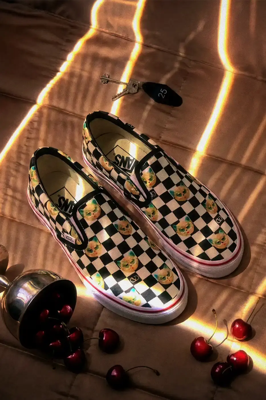 VALENTINO AND VANS RELEASE NEW SLIP-ON COLLECTION Valentino and Vans collaborate on six Classic Slip-On sneaker styles with signature VLogo patterns, checkerboard designs, and tropical prints, priced at $490 USD. (image 2 of 7)