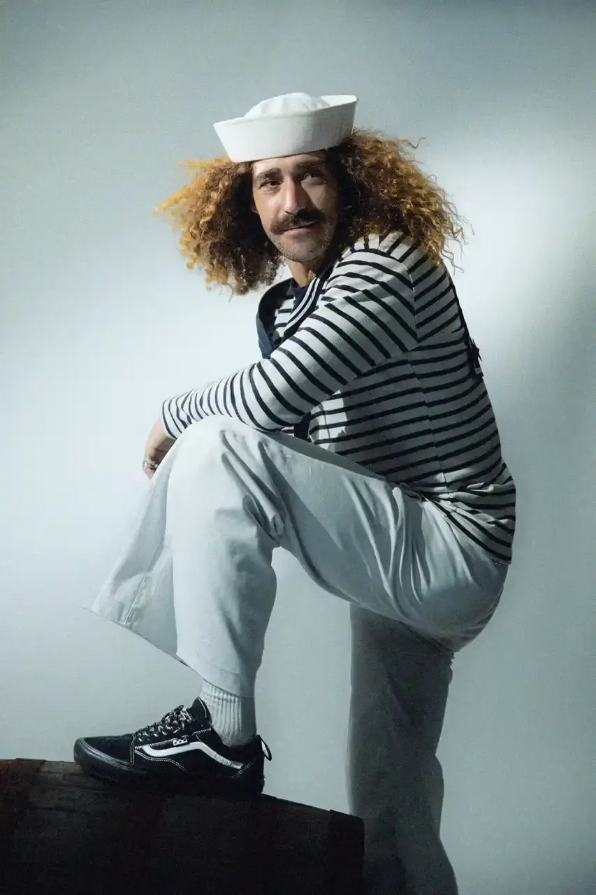PELLEGRIN'S NAUTICAL TWIST ON VANS CLASSIC MAKES WAVES image of the collaboration between French skateboarder and fisherman Victor "Doobie" Pellegrin and Vans to create the Doobie Skate Old Skool Net. The article describes the shoe's special features including water-resistant suede, hidden mesh pockets, durable canvas panels, and reinforced laces. It also mentions the promotional film "Ye Tale of Doobie" shot in Cornwall featuring several skaters, and notes the April 24 release date across European skate shops, with pricing not yet announced.