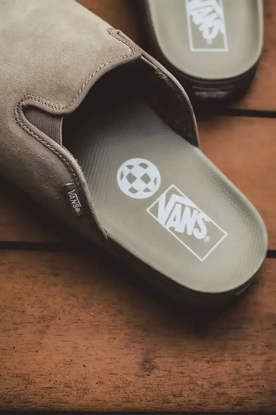 VANS HARBOR MULE SLIP-ON SURFACES AT SELECT RETAILERS image covers the new Vans Harbor Mule Slip-On, a suede slip-on shoe with faux fur lining, available in Black and Khaki colors at select Philippines retailers. (image 5 of 5)