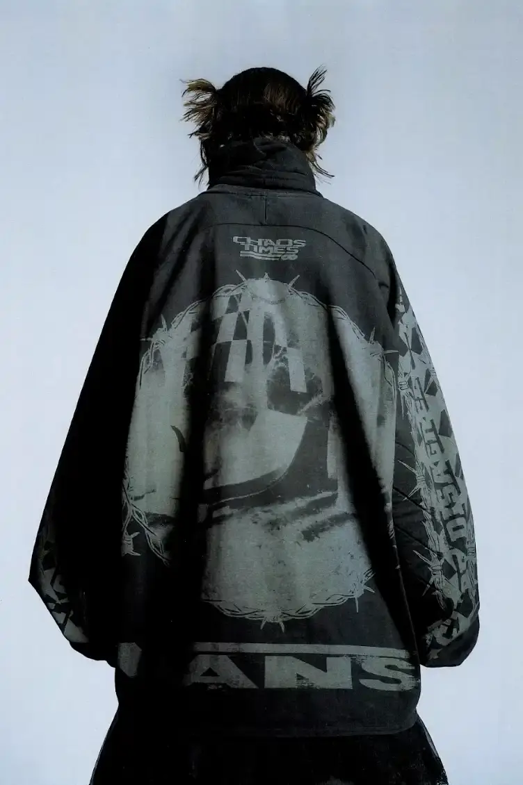 VANS AND SLAM JAM LAUNCH ACT OF DISAGREEMENT image about the collaboration between Vans and Slam Jam on a new clothing line called Act of Disagreement, featuring oversized hoodies, fleece jackets, and cropped pants. (image 8 of 9)