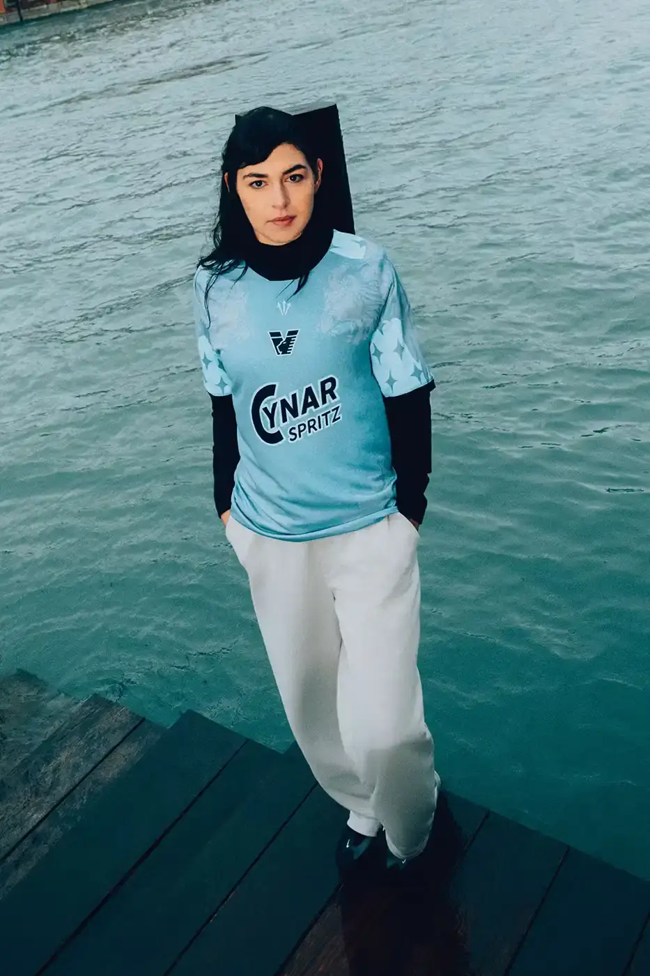 VENEZIA FC AND NOCTA DROP FOURTH KIT FOR 25/26 image about Venezia FC's collaboration with NOCTA on a new football jersey design inspired by Venice's lagoon, featuring local athletes and cultural figures in the campaign. (image 6 of 10)