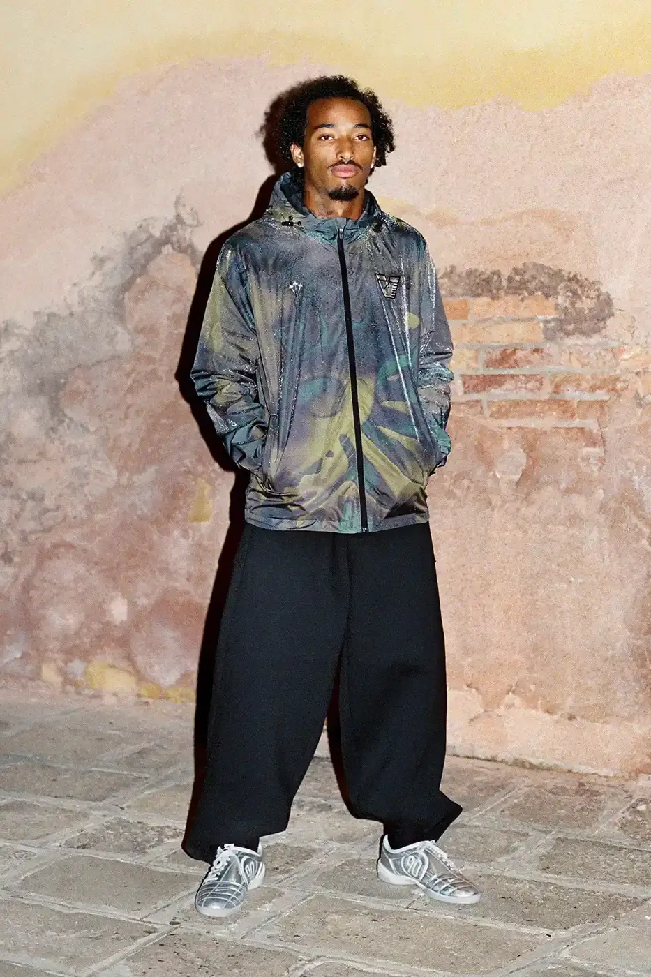 VENEZIA FC LAUNCHES LION CAMO RAIN JACKET Venezia FC and NOCTA present a new rain jacket with Lion emblem and camouflage pattern inspired by Venice's lagoons. (image 2 of 15)