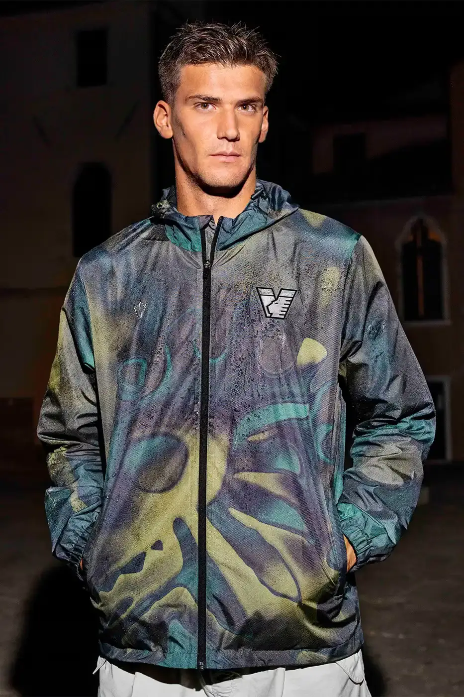 VENEZIA FC LAUNCHES LION CAMO RAIN JACKET Venezia FC and NOCTA present a new rain jacket with Lion emblem and camouflage pattern inspired by Venice's lagoons. (image 15 of 15)