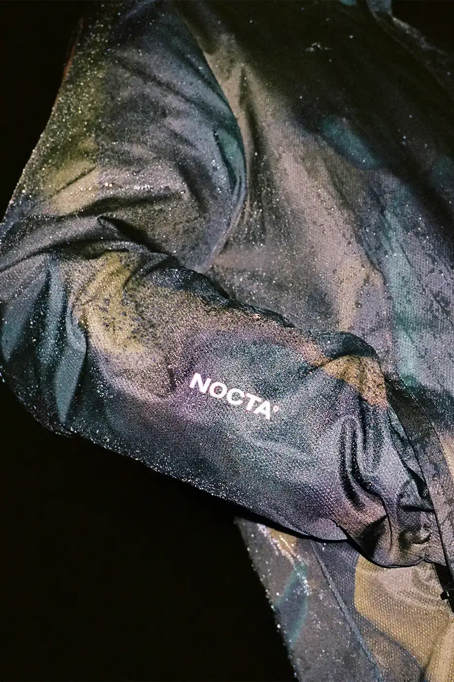 VENEZIA FC LAUNCHES LION CAMO RAIN JACKET Venezia FC and NOCTA present a new rain jacket with Lion emblem and camouflage pattern inspired by Venice's lagoons. (image 6 of 15)