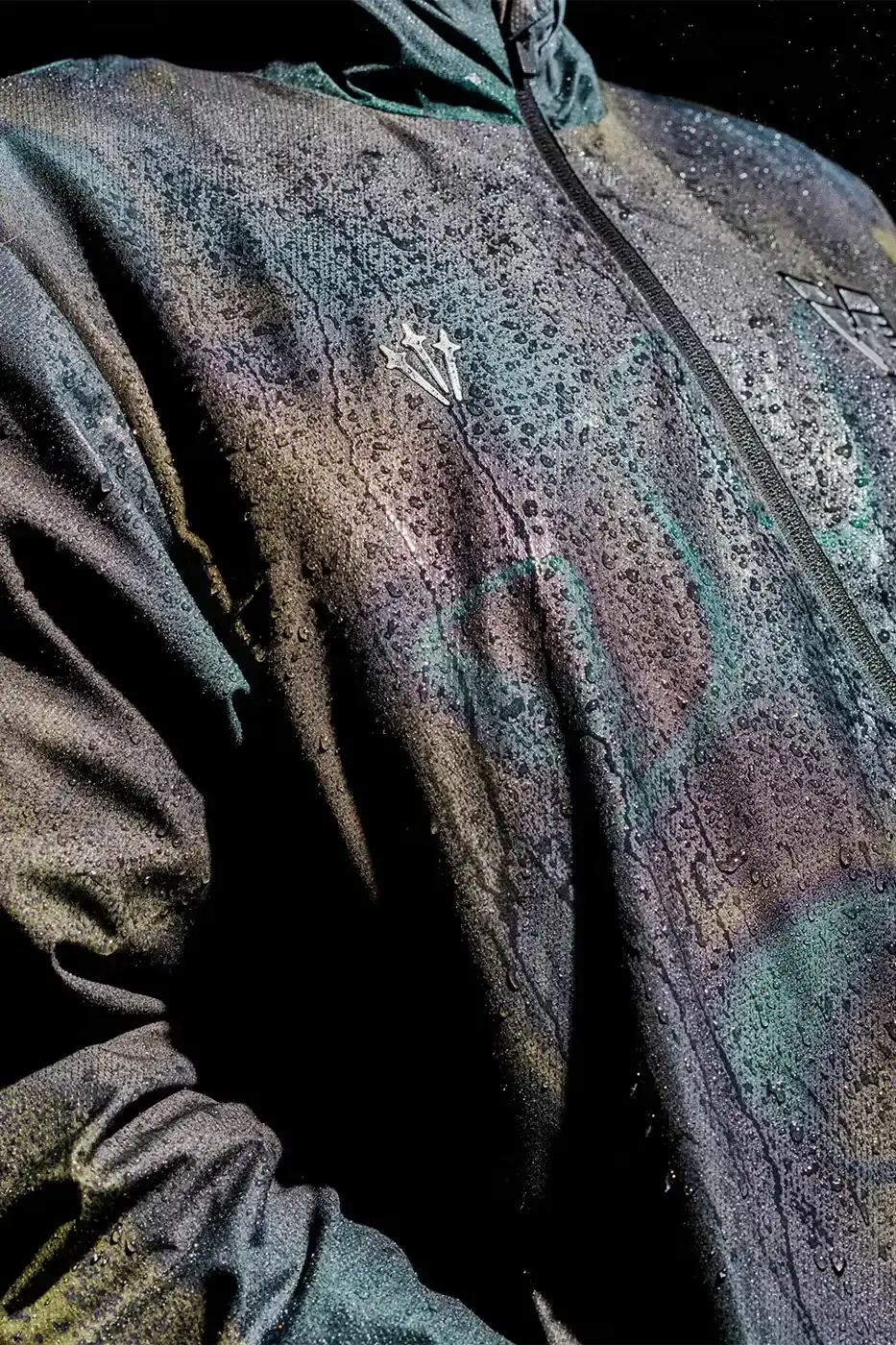 VENEZIA FC LAUNCHES LION CAMO RAIN JACKET Venezia FC and NOCTA present a new rain jacket with Lion emblem and camouflage pattern inspired by Venice's lagoons. (image 8 of 15)