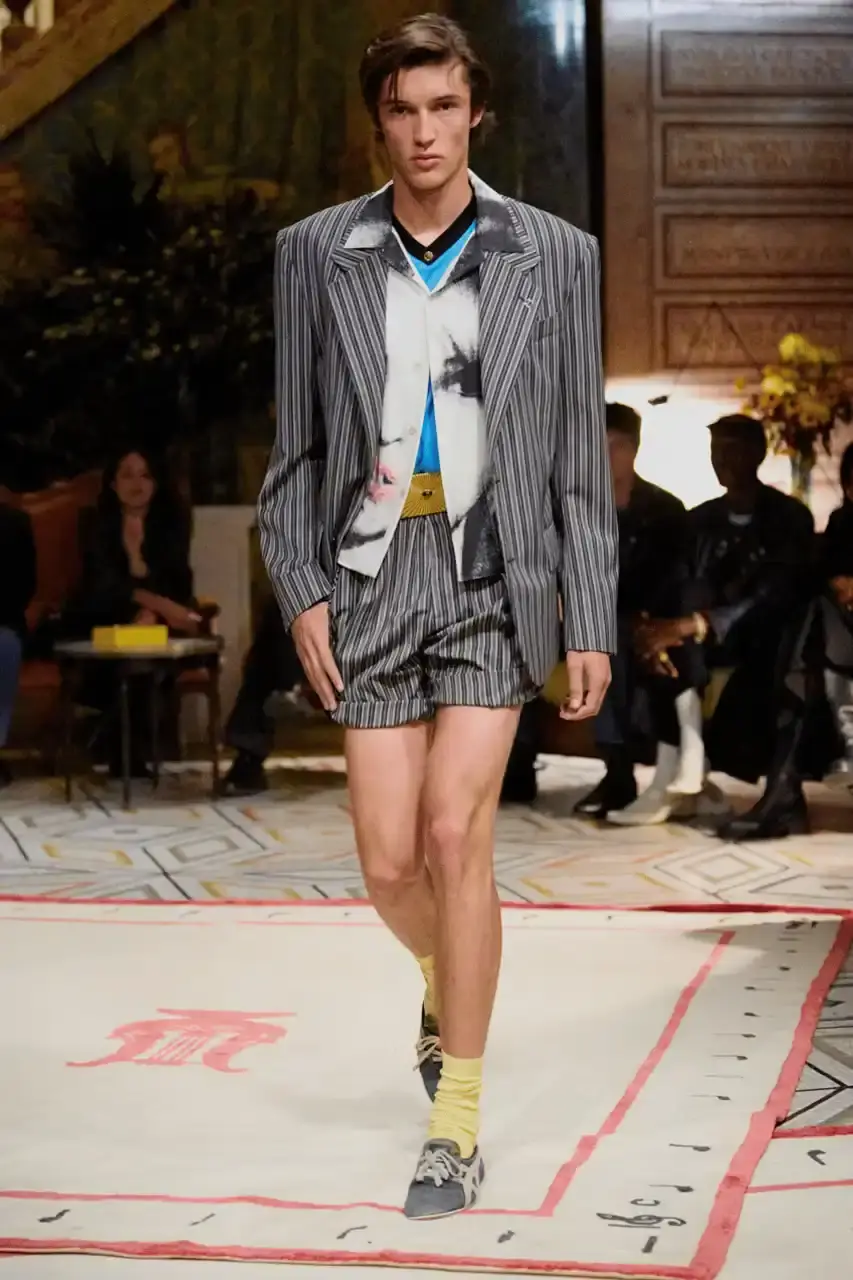 VERSACE AND ONITSUKA TIGER DEBUT FOOTWEAR COLLABORATION Versace collaborates with Onitsuka Tiger on two footwear designs, the TAI-CHI sneaker and a loafer, both set to release in spring 2026. (image 2 of 8)