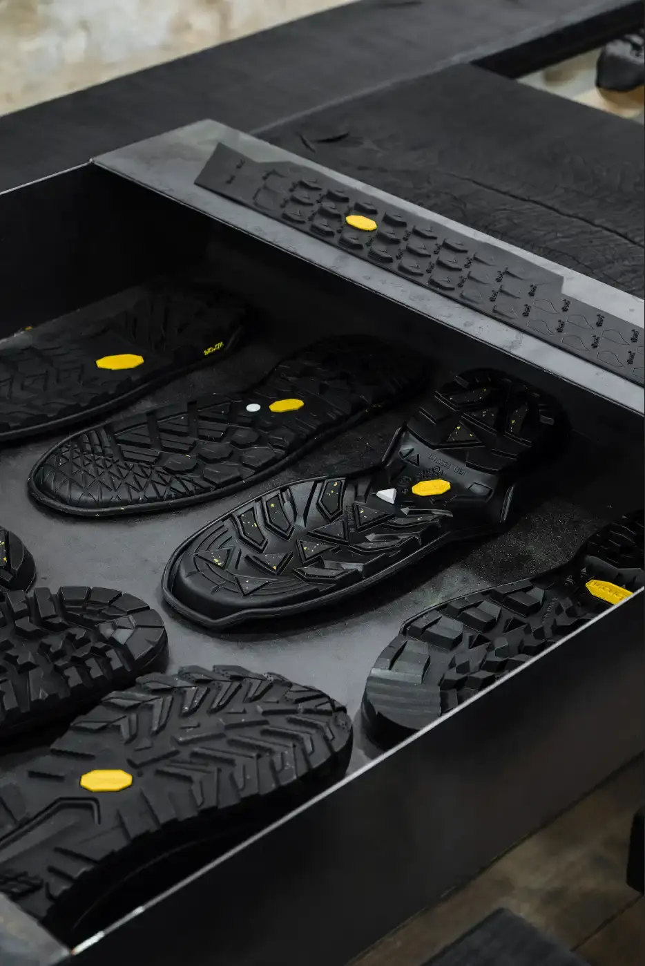 VIBRAM LOOKS AT EXTREME WORK THROUGH INDUSTRIAL FOOTWEAR This image explains Vibram’s Extreme Works installation and examines how industrial workers use technical footwear in harsh environments. (image 2 of 6)