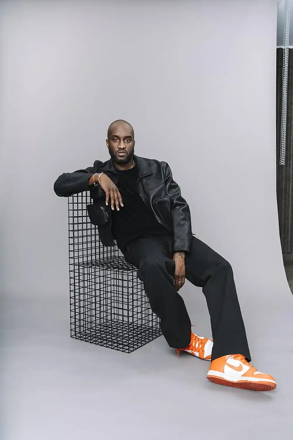 image by Bogdan "Chilldays" Plakov describes a major exhibition of Virgil Abloh's work at the Grand Palais in Paris. The exhibition runs from September 30 to October 10 and displays materials from his 20,000-item archive, including sketches, prototypes, and personal collections. The article explains the exhibition's scope, location, dates, organizers, and additional programming such as workshops and screenings.