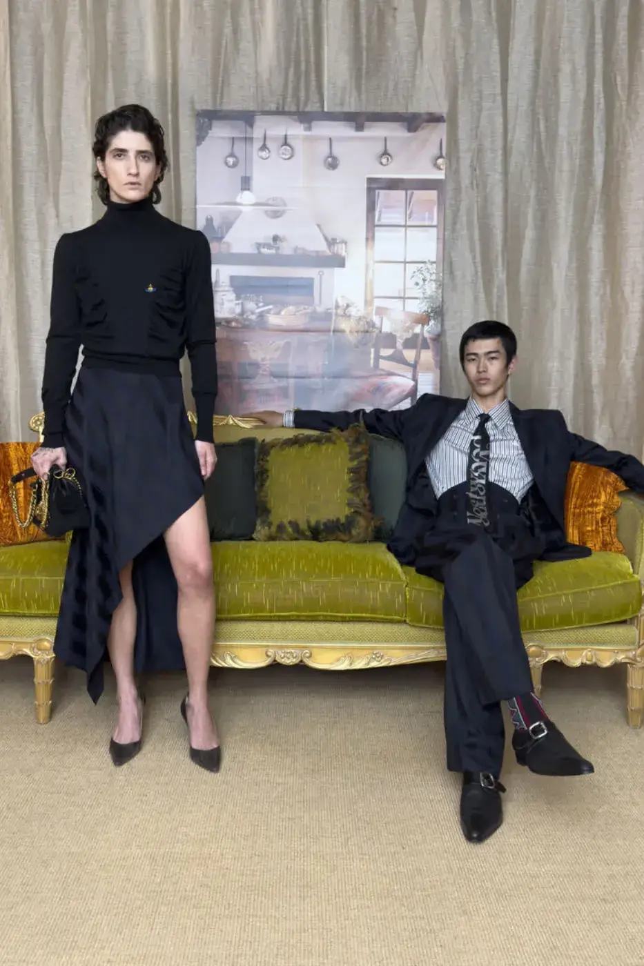 VIVIENNE WESTWOOD FW26 ITALIAN PUNK CAMPAIGN This image describes Vivienne Westwood's Fall Winter 2026 fashion campaign, featuring models in punk style knitwear posing among ornate Italian furniture. (image 6 of 15)