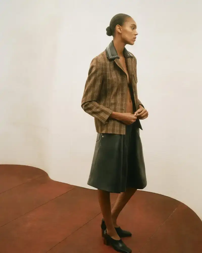WALES BONNER EXPLORES MODERNIST ARCHITECTURE Wales Bonner Fall/Winter 2026 collection inspired by modernist architecture, featuring structured garments, collaborative craftsmanship, and cultural references. (image 15 of 25)