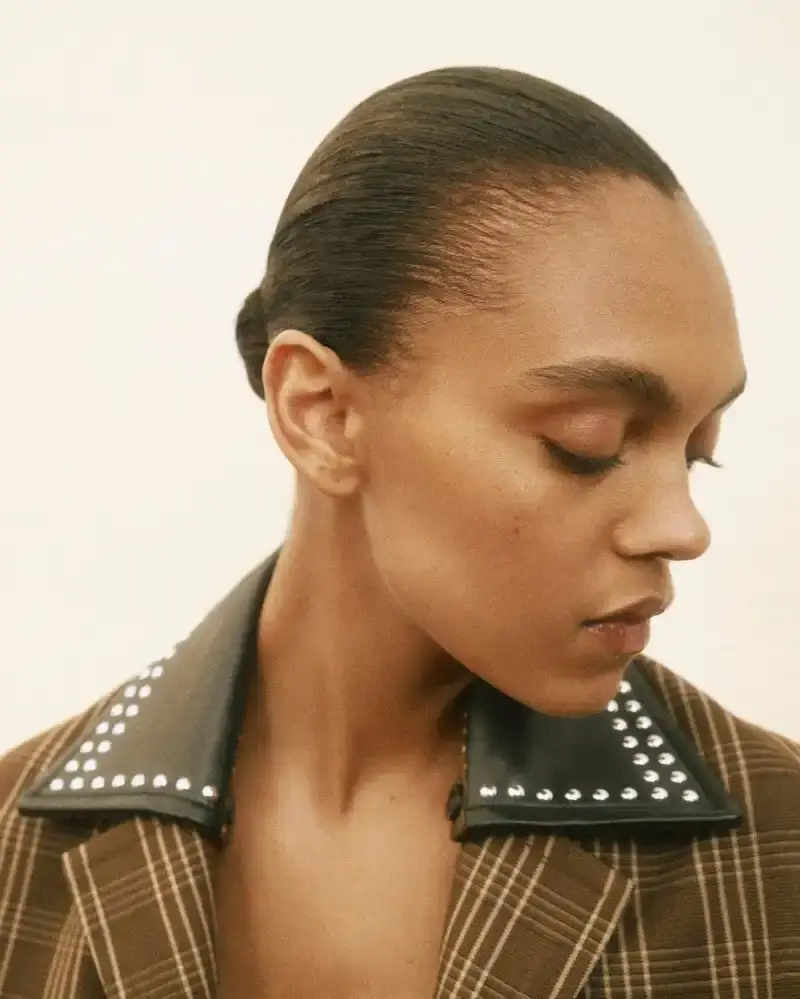 WALES BONNER EXPLORES MODERNIST ARCHITECTURE Wales Bonner Fall/Winter 2026 collection inspired by modernist architecture, featuring structured garments, collaborative craftsmanship, and cultural references. (image 14 of 25)