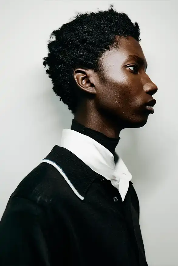 WALES BONNER TEAMS UP WITH JOHN SMEDLEY ON NEW POLOS Designer Grace Wales Bonner collaborates with British heritage knitwear brand John Smedley on a collection of three Merino wool polo shirts for Spring/Summer 2026. (image 3 of 4)