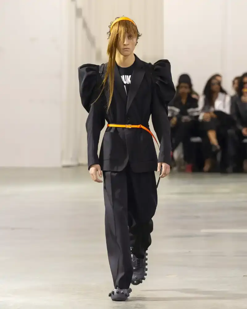 WALTER VAN BEIRENDONCK'S FALL/WINTER 2026 Belgian designer Walter Van Beirendonck presents his Fall/Winter 2026-2027 collection SCARE the CROW / SCARECROW, drawing from Art Brut influences and examining contemporary youth culture through contrasting elements of aggression and tenderness. (image 15 of 51)