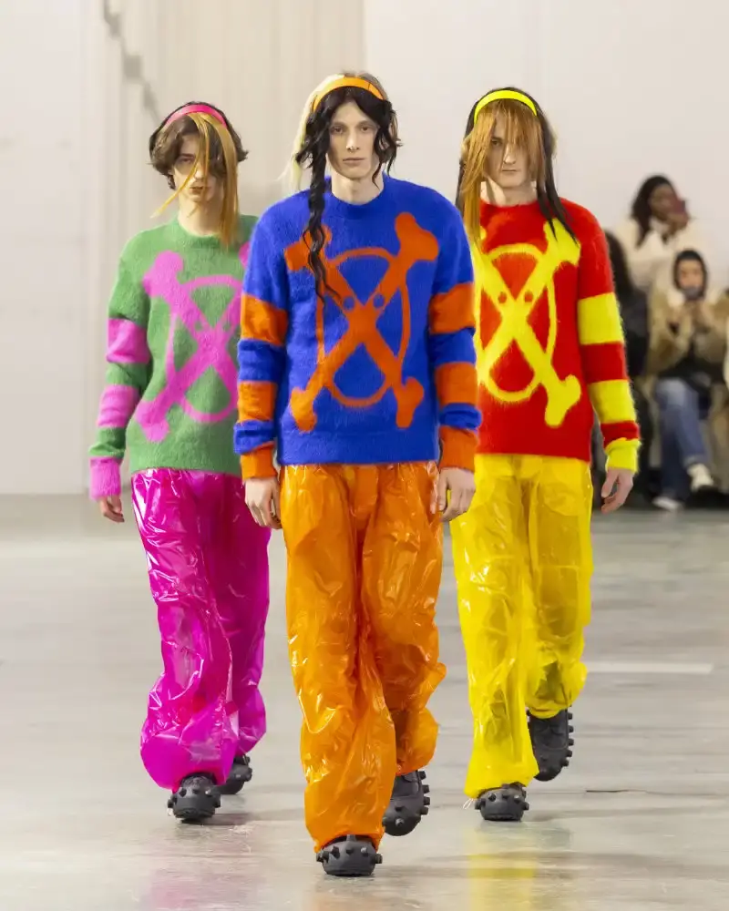 WALTER VAN BEIRENDONCK'S FALL/WINTER 2026 Belgian designer Walter Van Beirendonck presents his Fall/Winter 2026-2027 collection SCARE the CROW / SCARECROW, drawing from Art Brut influences and examining contemporary youth culture through contrasting elements of aggression and tenderness. (image 18 of 51)