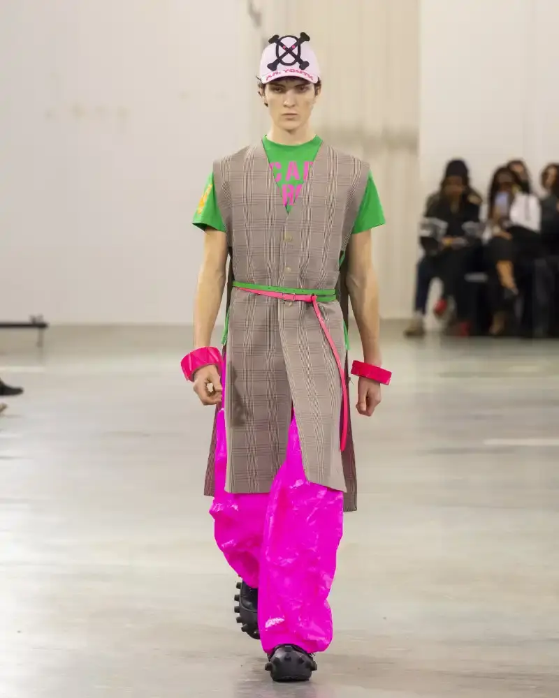 WALTER VAN BEIRENDONCK'S FALL/WINTER 2026 Belgian designer Walter Van Beirendonck presents his Fall/Winter 2026-2027 collection SCARE the CROW / SCARECROW, drawing from Art Brut influences and examining contemporary youth culture through contrasting elements of aggression and tenderness. (image 6 of 51)