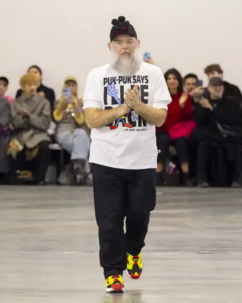 WALTER VAN BEIRENDONCK'S FALL/WINTER 2026 Belgian designer Walter Van Beirendonck presents his Fall/Winter 2026-2027 collection SCARE the CROW / SCARECROW, drawing from Art Brut influences and examining contemporary youth culture through contrasting elements of aggression and tenderness. (image 51 of 51)
