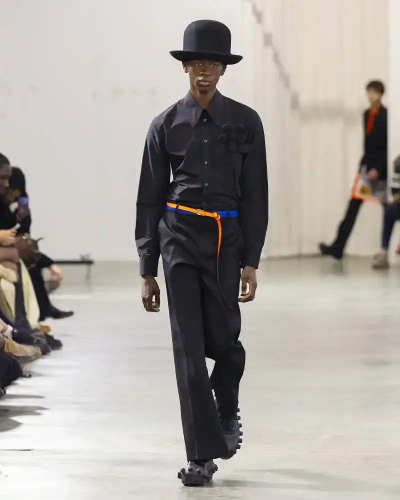 WALTER VAN BEIRENDONCK'S FALL/WINTER 2026 Belgian designer Walter Van Beirendonck presents his Fall/Winter 2026-2027 collection SCARE the CROW / SCARECROW, drawing from Art Brut influences and examining contemporary youth culture through contrasting elements of aggression and tenderness. (image 49 of 51)