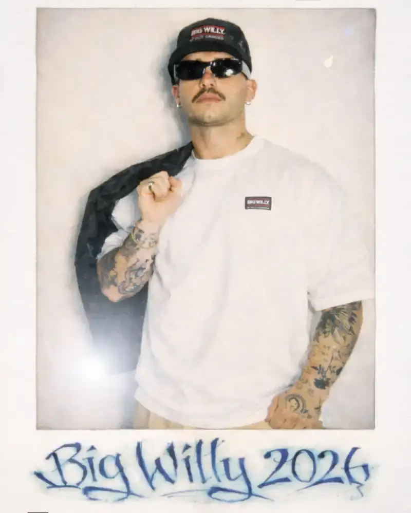 WILLY CHAVARRIA EXPANDS WITH BIG WILLY LINE Willy Chavarria debuts BIG WILLY, a workwear collection featuring chinos, work shirts, bomber jackets, and coach jackets at accessible prices, available exclusively on the brand's website. (image 2 of 5)