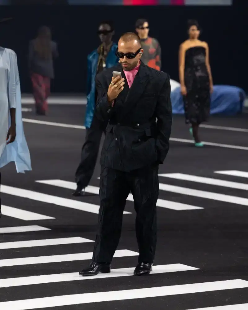 WILLY CHAVARRIA RETURNS TO PARIS FOR FALL/WINTER 2026 Fashion designer Willy Chavarria presented his Fall/Winter 2026 collection at Paris Fashion Week, featuring approximately 100 looks across three acts. The collection moved from everyday workwear through streetwear to fine tailoring, with improved fabrics and continued focus on representing real people. (image 47 of 47)
