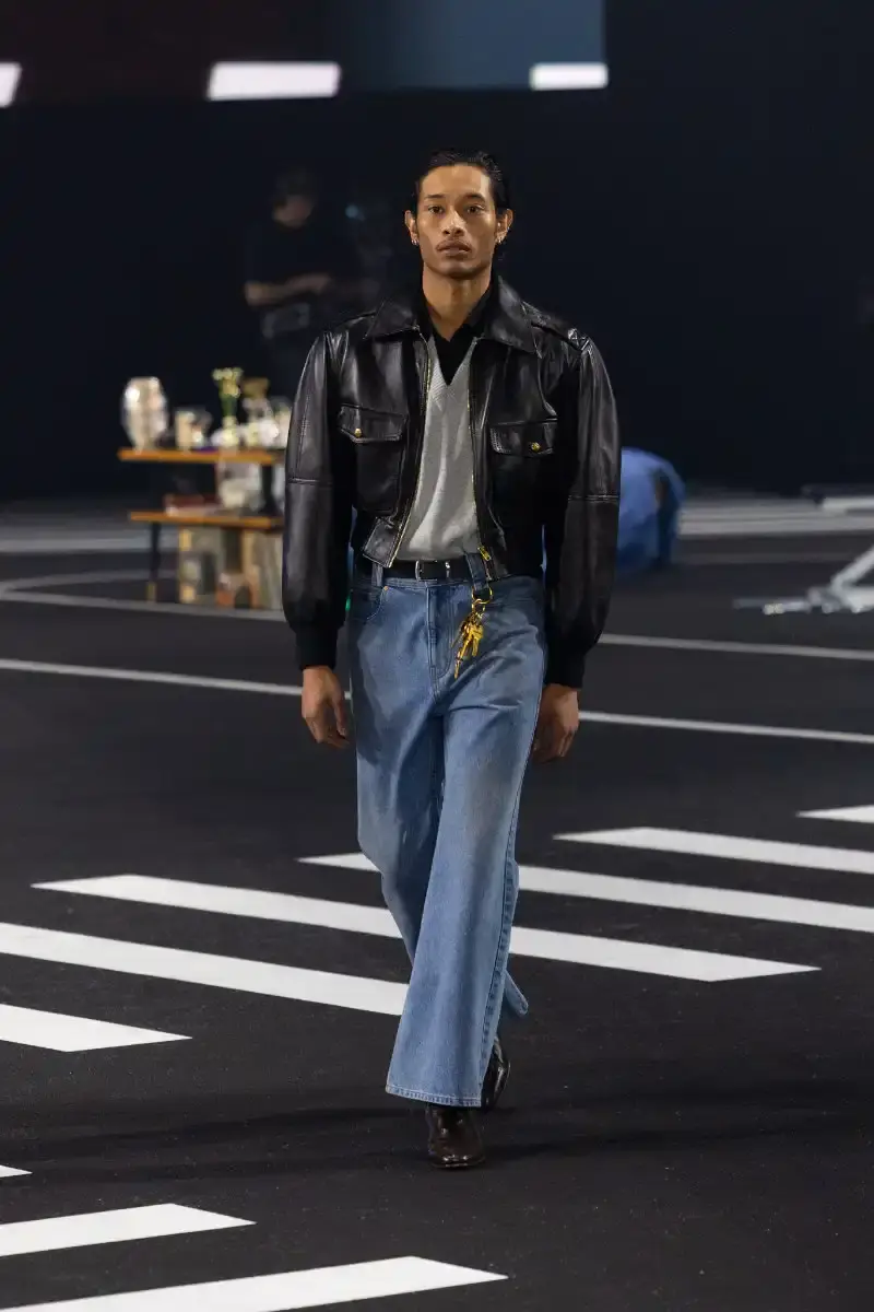 WILLY CHAVARRIA RETURNS TO PARIS FOR FALL/WINTER 2026 Fashion designer Willy Chavarria presented his Fall/Winter 2026 collection at Paris Fashion Week, featuring approximately 100 looks across three acts. The collection moved from everyday workwear through streetwear to fine tailoring, with improved fabrics and continued focus on representing real people. (image 27 of 47)
