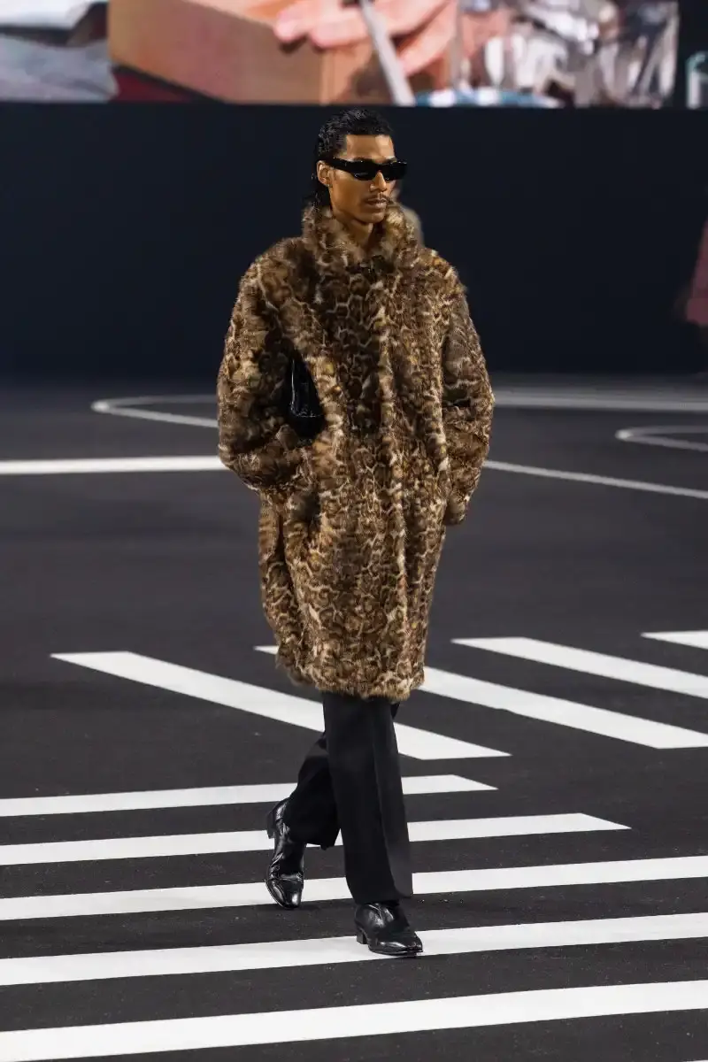 WILLY CHAVARRIA RETURNS TO PARIS FOR FALL/WINTER 2026 Fashion designer Willy Chavarria presented his Fall/Winter 2026 collection at Paris Fashion Week, featuring approximately 100 looks across three acts. The collection moved from everyday workwear through streetwear to fine tailoring, with improved fabrics and continued focus on representing real people. (image 35 of 47)
