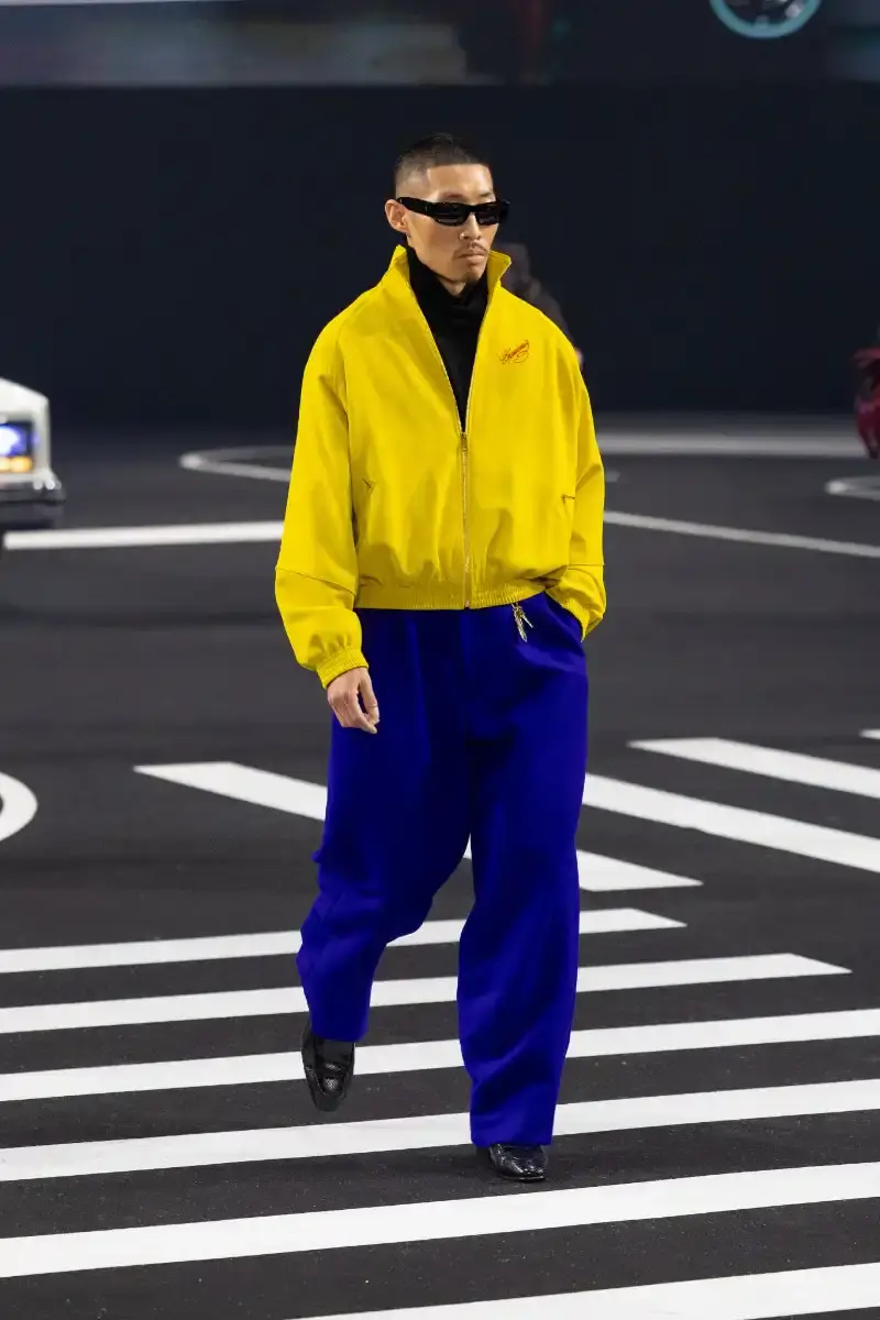WILLY CHAVARRIA RETURNS TO PARIS FOR FALL/WINTER 2026 Fashion designer Willy Chavarria presented his Fall/Winter 2026 collection at Paris Fashion Week, featuring approximately 100 looks across three acts. The collection moved from everyday workwear through streetwear to fine tailoring, with improved fabrics and continued focus on representing real people. (image 23 of 47)