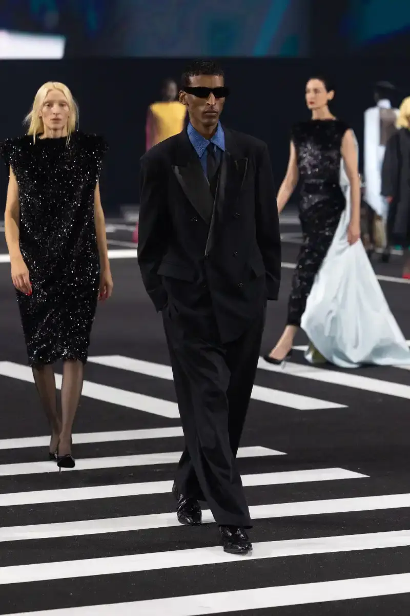 WILLY CHAVARRIA RETURNS TO PARIS FOR FALL/WINTER 2026 Fashion designer Willy Chavarria presented his Fall/Winter 2026 collection at Paris Fashion Week, featuring approximately 100 looks across three acts. The collection moved from everyday workwear through streetwear to fine tailoring, with improved fabrics and continued focus on representing real people. (image 3 of 47)