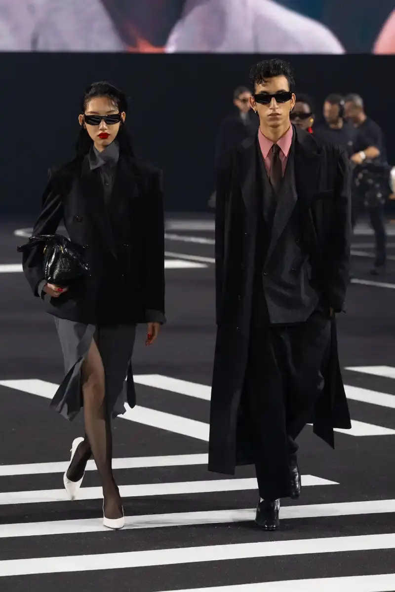WILLY CHAVARRIA RETURNS TO PARIS FOR FALL/WINTER 2026 Fashion designer Willy Chavarria presented his Fall/Winter 2026 collection at Paris Fashion Week, featuring approximately 100 looks across three acts. The collection moved from everyday workwear through streetwear to fine tailoring, with improved fabrics and continued focus on representing real people. (image 43 of 47)