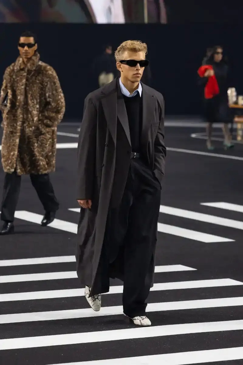 WILLY CHAVARRIA RETURNS TO PARIS FOR FALL/WINTER 2026 Fashion designer Willy Chavarria presented his Fall/Winter 2026 collection at Paris Fashion Week, featuring approximately 100 looks across three acts. The collection moved from everyday workwear through streetwear to fine tailoring, with improved fabrics and continued focus on representing real people. (image 36 of 47)