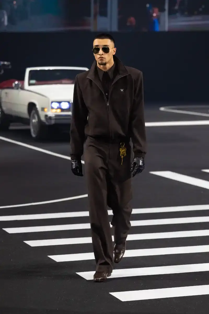 WILLY CHAVARRIA RETURNS TO PARIS FOR FALL/WINTER 2026 Fashion designer Willy Chavarria presented his Fall/Winter 2026 collection at Paris Fashion Week, featuring approximately 100 looks across three acts. The collection moved from everyday workwear through streetwear to fine tailoring, with improved fabrics and continued focus on representing real people. (image 20 of 47)
