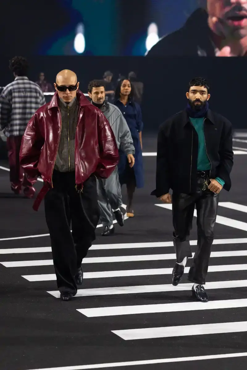 WILLY CHAVARRIA RETURNS TO PARIS FOR FALL/WINTER 2026 Fashion designer Willy Chavarria presented his Fall/Winter 2026 collection at Paris Fashion Week, featuring approximately 100 looks across three acts. The collection moved from everyday workwear through streetwear to fine tailoring, with improved fabrics and continued focus on representing real people. (image 29 of 47)
