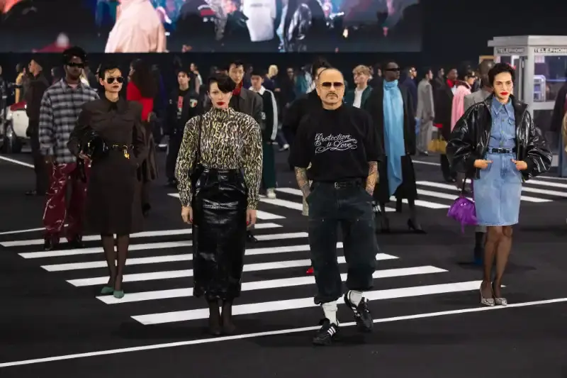 Fashion designer Willy Chavarria presented his Fall/Winter 2026 collection at Paris Fashion Week, featuring approximately 100 looks across three acts. The collection moved from everyday workwear through streetwear to fine tailoring, with improved fabrics and continued focus on representing real people. (image 3 of 3)