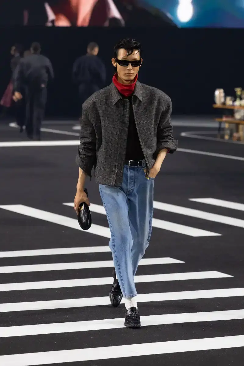 WILLY CHAVARRIA RETURNS TO PARIS FOR FALL/WINTER 2026 Fashion designer Willy Chavarria presented his Fall/Winter 2026 collection at Paris Fashion Week, featuring approximately 100 looks across three acts. The collection moved from everyday workwear through streetwear to fine tailoring, with improved fabrics and continued focus on representing real people. (image 31 of 47)