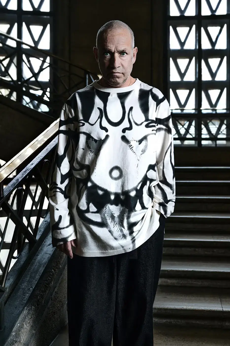 Y-3 FW26 CAMPAIGN FEATURES MARK GONZALES An editorial article detailing the Y-3 Fall/Winter 2026 campaign. The text describes the apparel and footwear, focusing on the collaboration between Adidas, Yohji Yamamoto, and Mark Gonzales. (image 11 of 14)