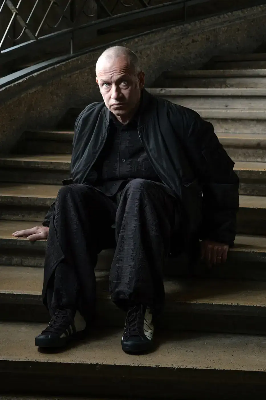 Y-3 FW26 CAMPAIGN FEATURES MARK GONZALES An editorial article detailing the Y-3 Fall/Winter 2026 campaign. The text describes the apparel and footwear, focusing on the collaboration between Adidas, Yohji Yamamoto, and Mark Gonzales. (image 5 of 14)