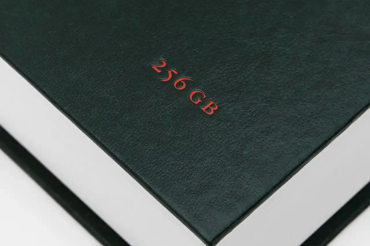 YUNG LEAN RELEASES IPHONE ARCHIVE BOOK image about musician Yung Lean's first book publication, containing ten years of personal iPhone content organized into themed chapters. The piece describes the book's physical design, content organization, and the artist's reflection on digital memory collection.