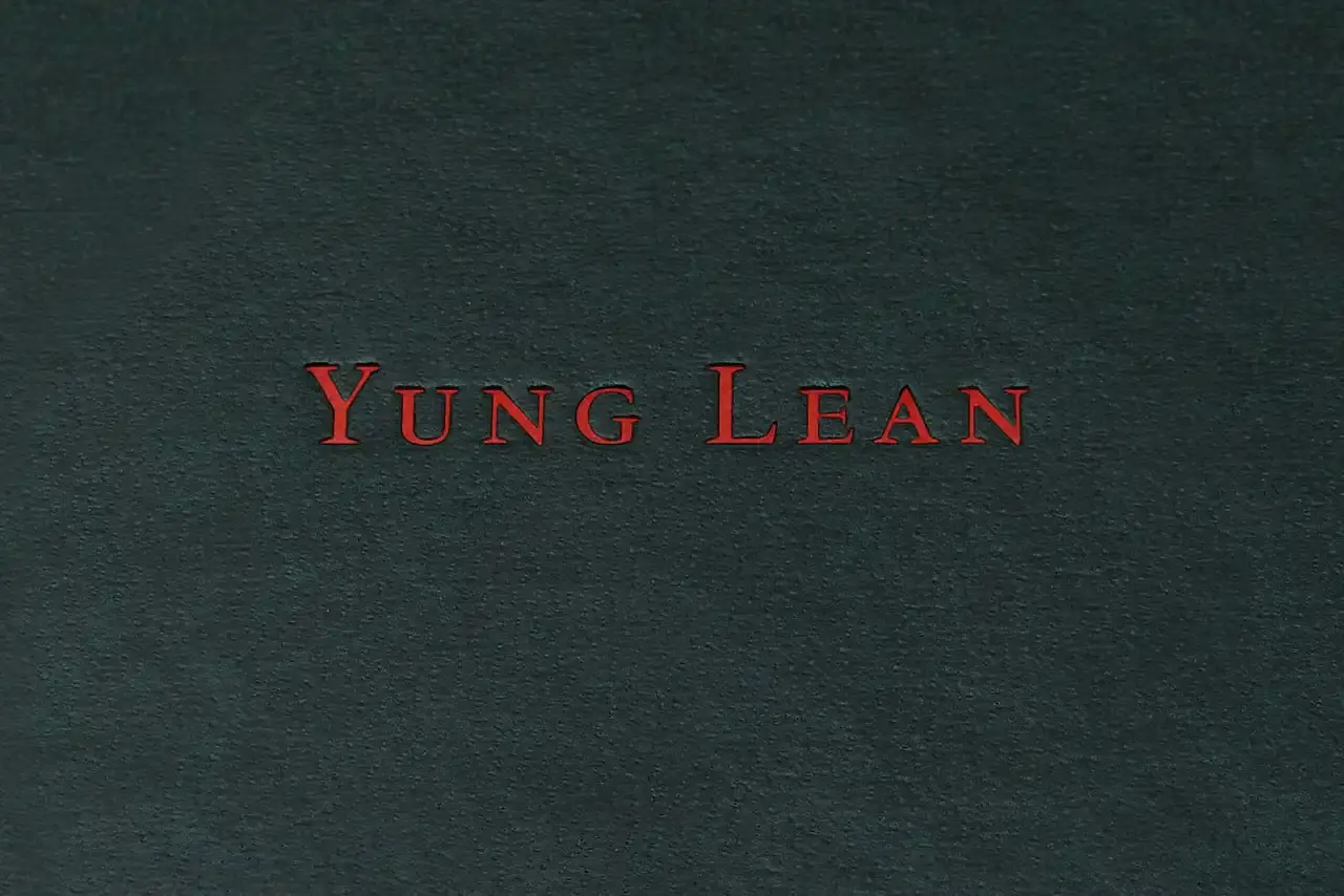 YUNG LEAN RELEASES IPHONE ARCHIVE BOOK image about musician Yung Lean's first book publication, containing ten years of personal iPhone content organized into themed chapters. The piece describes the book's physical design, content organization, and the artist's reflection on digital memory collection. (image 4 of 29)